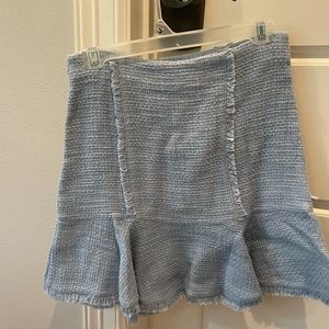 Likely blue mini skirt